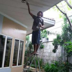 Tukang cat rumah kota warisan nilai