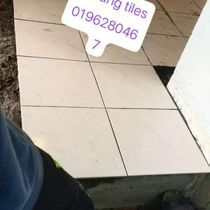 Tukang pasang tiles taman teratai