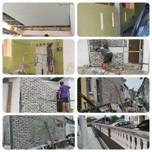 Tukang rumah dan bumbung bocor kajang