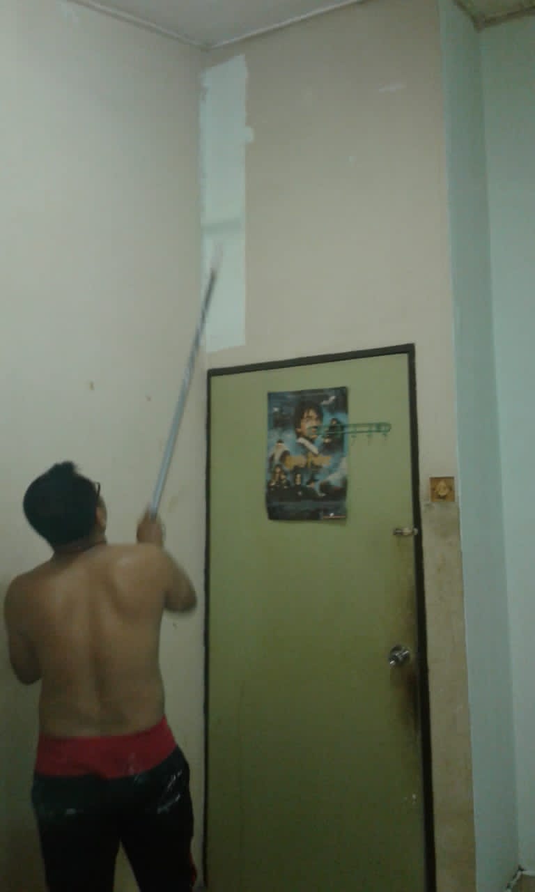 Tukang cat rumah dan pejabat