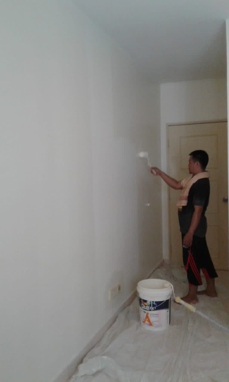 Tukang cat rumah dan pejabat