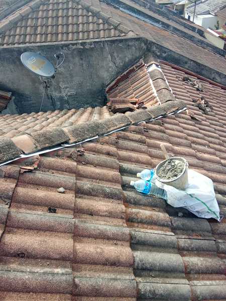 Baiki bumbung bocor bandar tasik puteri rawang  ayub