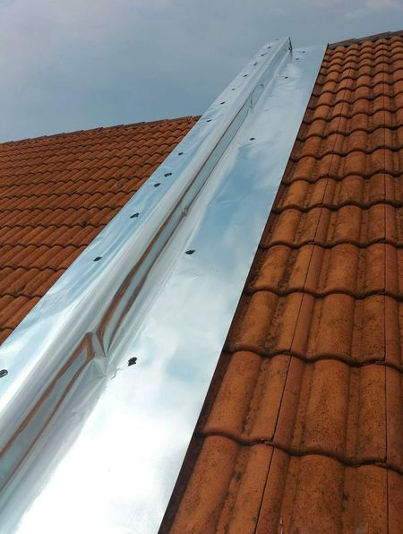 Tukang paip dan tukang bumbung